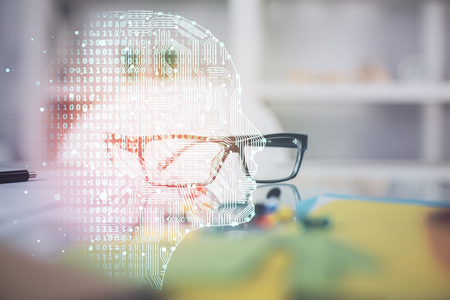 Brain drawings with glasses on the table background. Double exposure.の写真素材