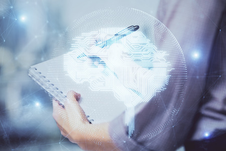 Multi exposure of womans writing hand on background with brain hologram. Concept of brainstorming.