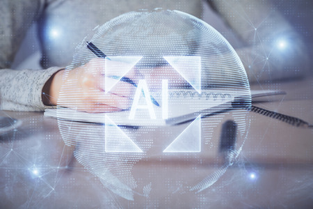 Double exposure of writing hand on background with data technology hologram. Big data concept.の写真素材