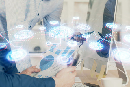 Social network theme hologram with businessman working on computer on background. Multi exposure.の写真素材