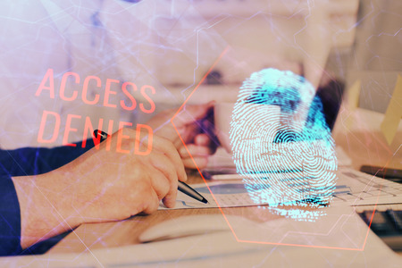 Concept of the future of security and password control through advanced technology. Fingerprint scan provides safe access with biometrics identification. Multi exposure.の写真素材