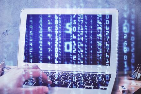 Double exposure of data internet theme hologram with man working on computer on background. Concept of innovation.の写真素材