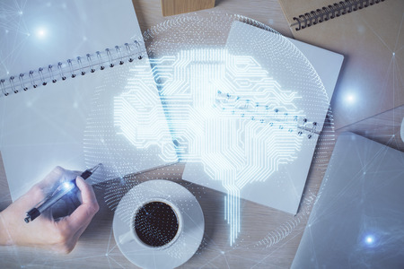 Multi exposure of womans writing hand on background with brain hologram. Concept of brainstorming.の写真素材