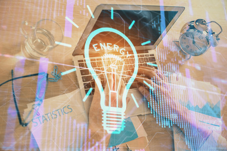 Growing arrows with businessman working on computer on background. Success concept. Double exposure.の写真素材