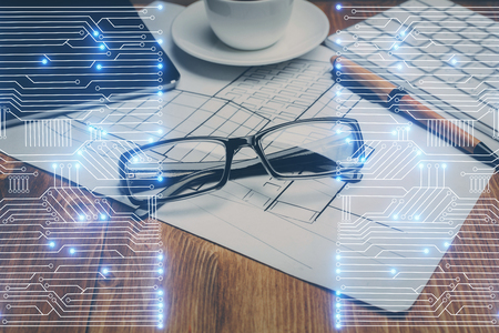Tech theme hologram with glasses on the table background. Technology concept. Double exposure.の写真素材