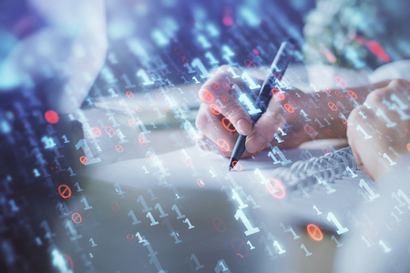 Double exposure of hands making notes background with technology and digital coding huds. Data learning concept.の写真素材