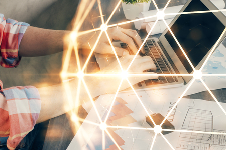 Media network theme hologram with man working on computer on background. Concept of internet communication. Double exposure.の写真素材