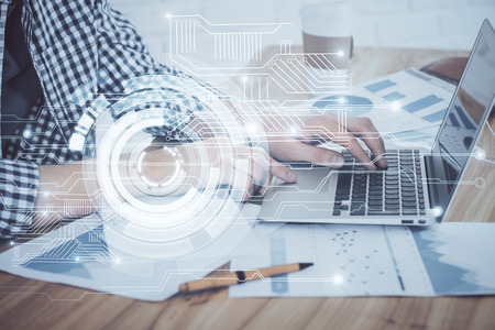 Businessman working on Laptop with technology theme drawing. Concept of big data. Double exposure.の写真素材