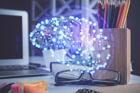 Brain drawings with glasses on the tableの写真素材