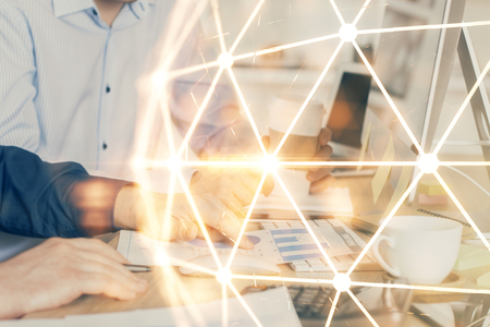 Social network theme hologram with businessman working on computer on background. Multi exposure.の写真素材