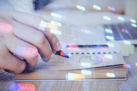 Writing human hands with data theme multi exposure icons.の写真素材