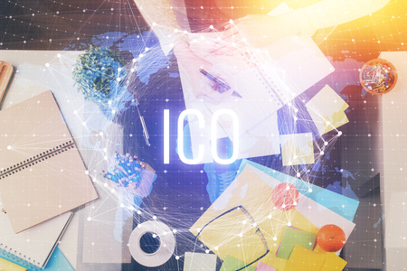 Cryptocurrency hologram over womans hands writing background. Concept of blockchain. Multi exposureの写真素材