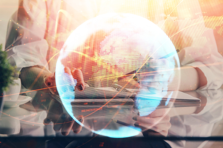 International business hud over womans hands writing background. Concept of hard work. Double exposureの写真素材