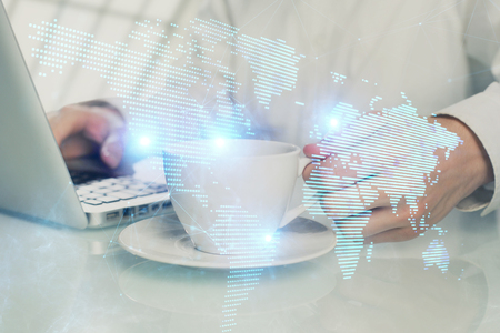 Social network theme hologram with businessman working on computer on background. Multi exposure.の写真素材