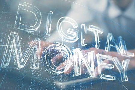 Crypto currency theme hologram with businessman working on computer on background. Concept of blockchain. Double exposure.の写真素材