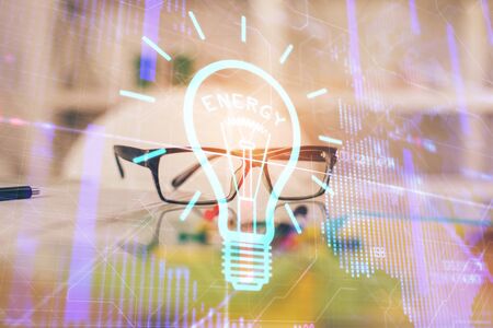 Bulb drawing with glasses on the table background. Idea concept. Double exposure.の写真素材