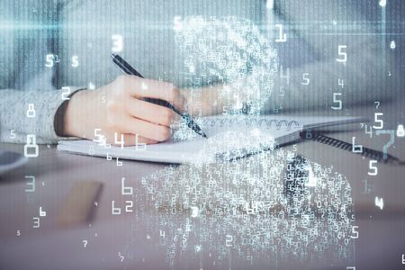 Double exposure of writing hand on background with data technology hologram. Big data concept.の写真素材