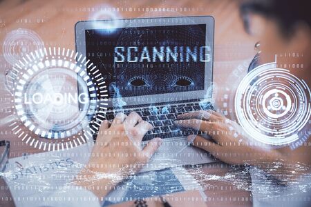 Businessman with computer background with technology theme hologram. Concept of big data. Double exposure.の写真素材