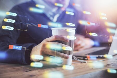 Double exposure of data internet theme hologram with man working on computer on background. Concept of innovation.の写真素材