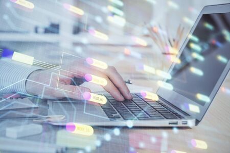 Businessman working on Laptop with technology theme drawing. Concept of big data. Double exposure.