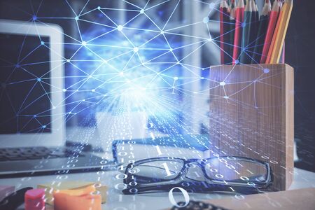 Data tech hologram with glasses on the table background. Concept of technology. Double exposure.の写真素材