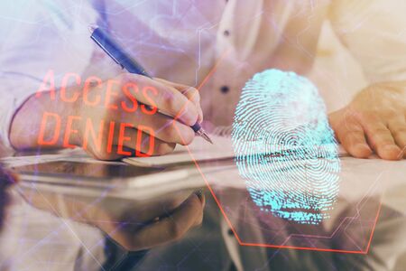 Fingerprint scan provides safe access with biometrics identification, concept of the future of security and password control through advanced technology. Double exposure.の写真素材