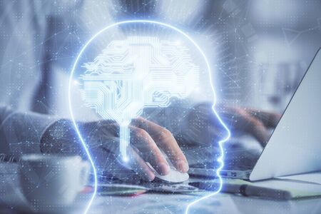 Man typing on keyboard background with brain hologram. Concept of big Data.