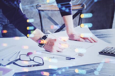 Writing man with technology icons. . Double exposure. Network and data concept.の写真素材