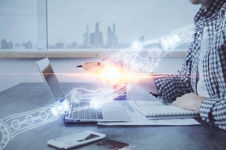 Businessman working on Laptop with technology theme drawing. Concept of big data. Double exposure.の写真素材