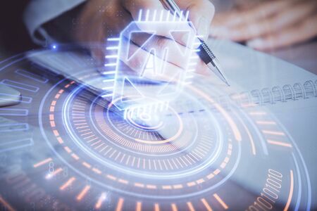 Double exposure of woman's writing hand on background with data technology hud. Big data concept.の写真素材