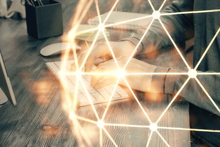 Social network theme hologram with businessman working on computer on background. Concept of world wide web. Multi exposure.の写真素材