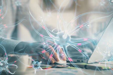 Neuron hologram with man working on computer on background. Education concept. Double exposure.