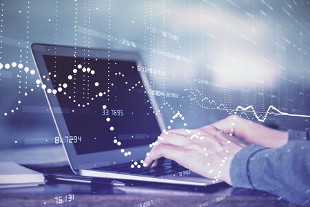 A man working on Laptop with technology theme drawing. Concept of big data. Double exposure.の写真素材