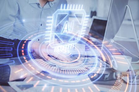 Double exposure of technology hologram with man working on computer background. Concept of big data.の写真素材