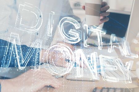 Crypto currency theme hologram with businessman working on computer on background. Concept of blockchain. Multi exposure.の写真素材