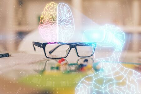 AR drawing with glasses on the table background. Concept of augmented reality. Double exposure.の写真素材