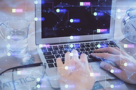 Businessman with computer background with technology theme hologram. Concept of big data. Double...