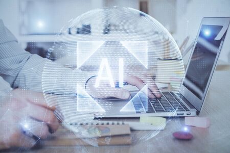 Businessman working on Laptop with technology theme drawing. Concept of big data. Double exposure.の写真素材