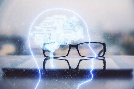 Brain drawings with glasses on the table background. Double exposure.