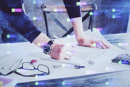 Writing man with technology icons. . Double exposure. Network and data concept.の写真素材