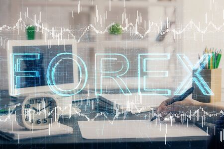 Financial graph displayed on woman's hand taking notes background. Concept of research. Multi exposureの写真素材