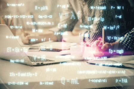 Science formula hologram with man working on computer on background. Education concept. Double...