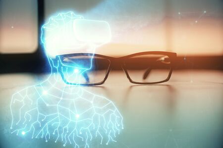AR drawing with glasses on the table background. Concept of augmented reality. Double exposure.