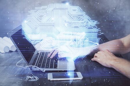 Man typing on keyboard background with brain hologram. Concept of big Data.