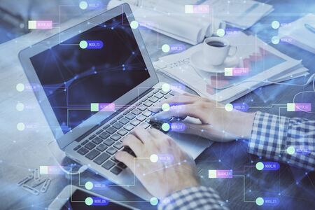 Double exposure of forex chart with man working on computer on background. Concept of market analysis.の写真素材