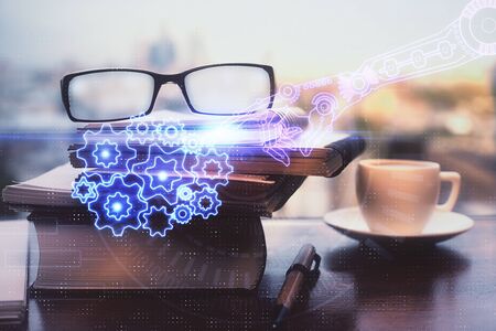 Data tech hologram with glasses on the table background. Concept of technology. Double exposure.