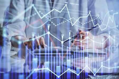 Financial chart drawn over hands taking notes background. Concept of research. Multi exposure