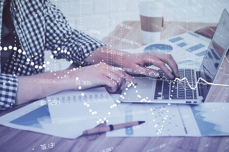 Businessman working on Laptop with technology theme drawing. Concept of big data. Double exposure.