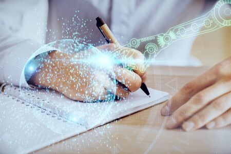Writing man's hands background with technology huds. Double exposure. Concept data.