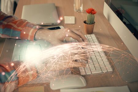 Social network theme hologram with businessman working on computer on background. Concept of world wide web. Double exposure.の写真素材